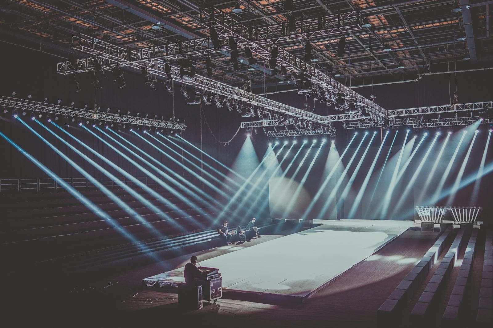 Overhead lighting rig with stage lights and truss structure